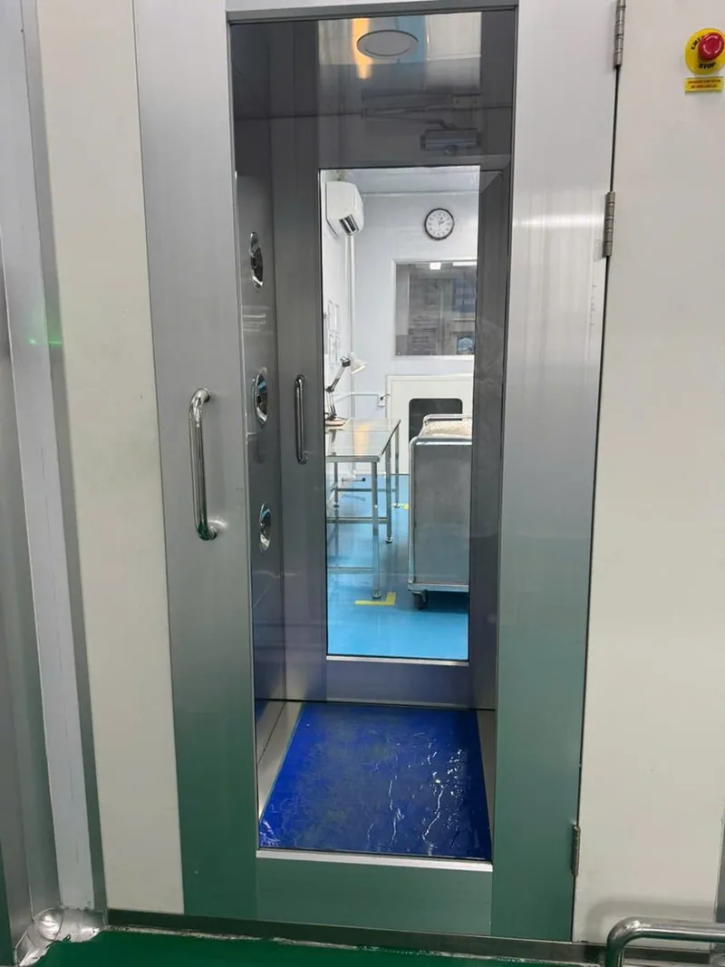Gowned operators packing in the cleanroom